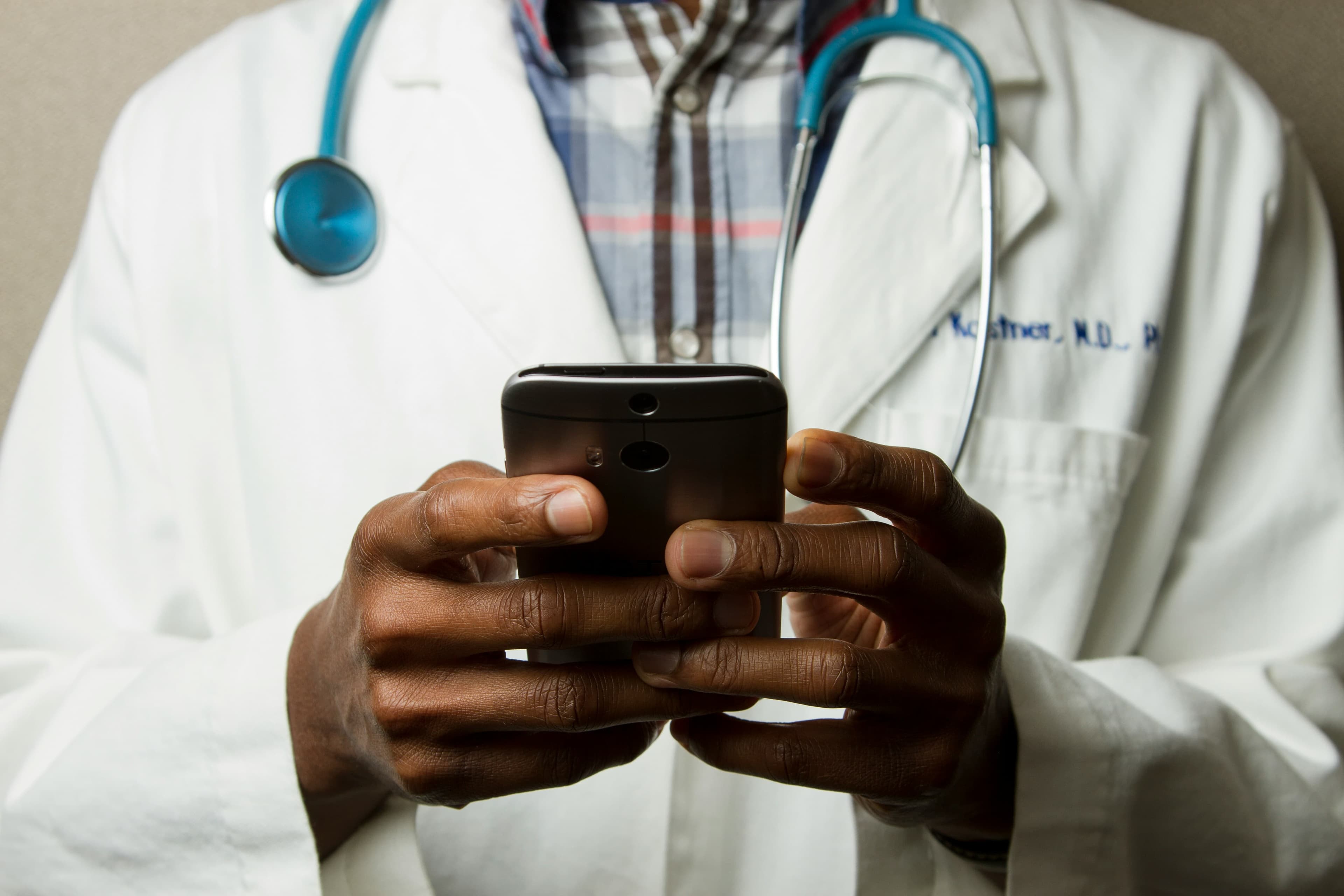 Doctor using a phone
